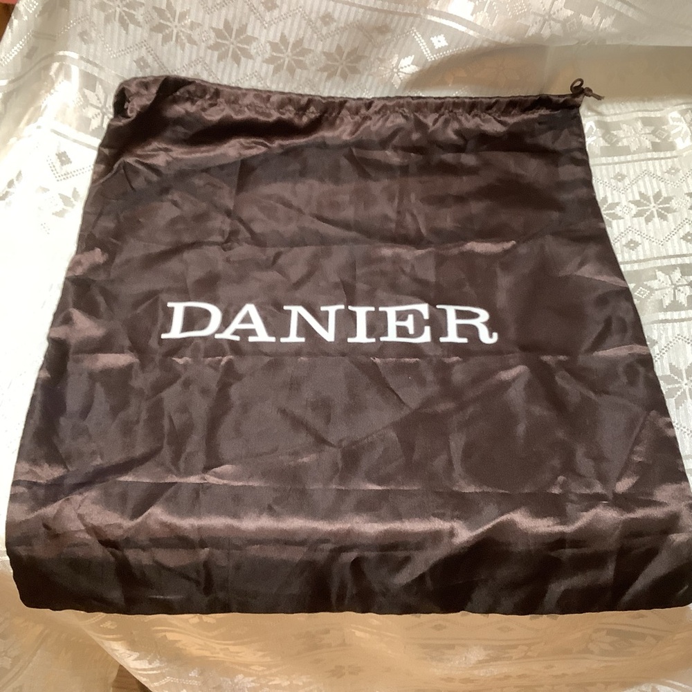 Danier Dust Cover Brown with White Lettering